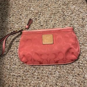 Pink/coal Coach wristlet